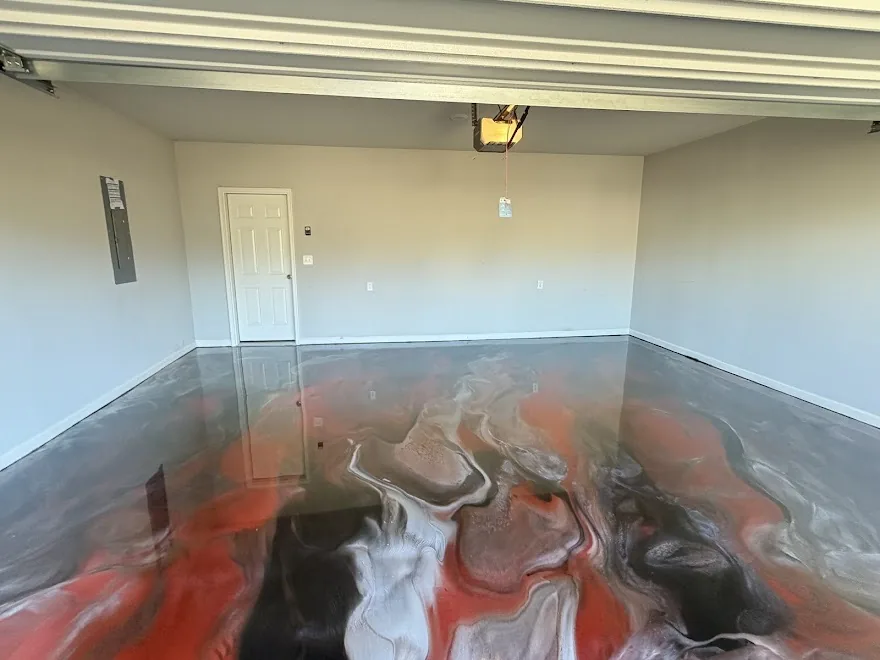 Wide metallic epoxy floor in a residential garage